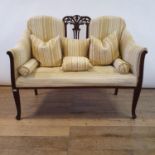 An early 20th century mahogany two seater sofa, 110 cm wide