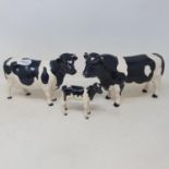 A Beswick Friesen bull CH. Coddington Hilt Bar, 1439A, a Friesen cow CH. Claybury Leegwater, 1362A