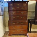 A 19th century mahogany chest on chest, the top with three short and three long drawers, above three