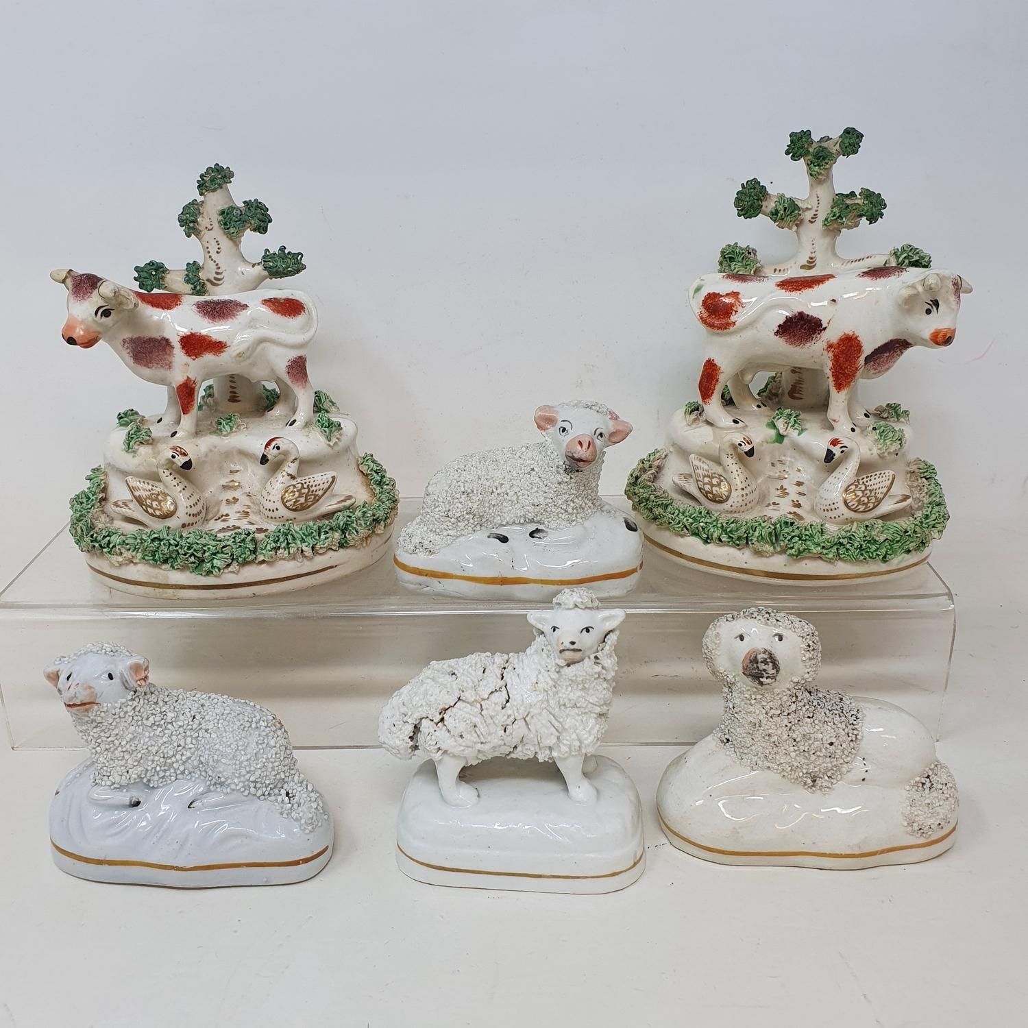 A pair of 19th century Staffordshire quill holders, applied sheep, and twenty other Staffordshire - Image 2 of 3