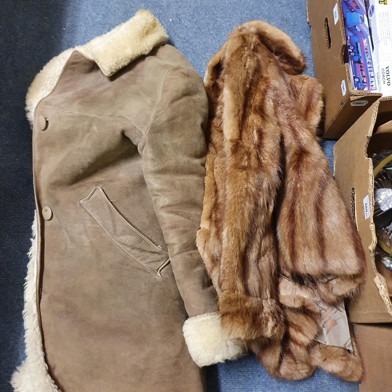 A fur jacket, a sheepskin coat, and other items (box)