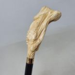 A 19th century walking stick, with carved ivory handle in the form of a vine and grapes, 18ct gold