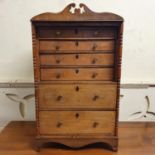 An early 20th century mahogany apprentice type chest, having six drawers, 55 cm high x 32 cm wide