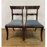 A set of four 19th century bar back dining chairs, with carved central rails and splayed legs, and