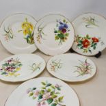 A 19th century dessert service, comprising four comports and twelve plates, decorated flowers, 23 cm
