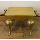 A 19th century brass footman, 52 cm wide