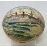 An ostrich egg, painted the ship SS Armdale Castle