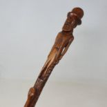 A 19th century folk art walking stick, the carved handle in the form of a bearded gentleman, the