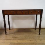 A 19th century mahogany side table, having three drawers, on turned tapering legs, 112 cm wide
