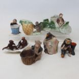 A novelty jug in the form of a monkey and a pineapple, and six other monkey's (7)