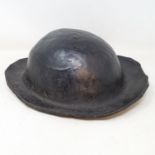 An 18th/19th century leather miner's hat, 30 cm wide