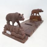 A late 19th/early 20th century Black Forest expanding book trough, carved bears, 43 cm wide (