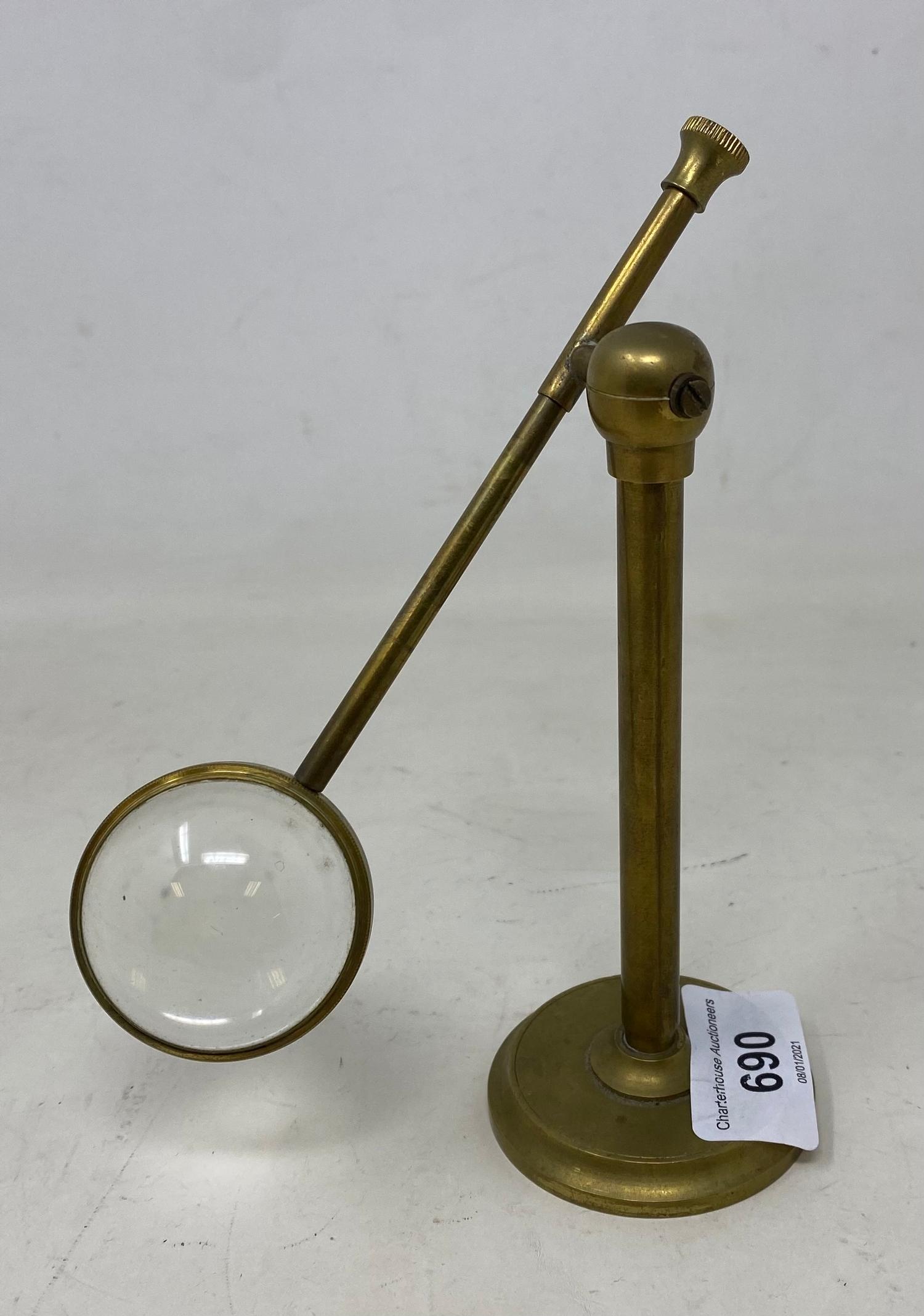 A student's brass magnifier, on a stand, 18 cm high