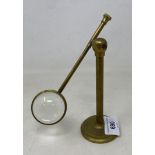 A student's brass magnifier, on a stand, 18 cm high