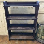 An Arts and Crafts style oak bookcase, the shelf fronts numbered 1-35, 92 cm wide