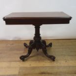 A 19th century mahogany card table, on a column support and four splayed legs, 94 cm wide