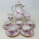 A Meissen porcelain coffee set, decorated flowers, highlighted in gilt, comprising a coffee pot,