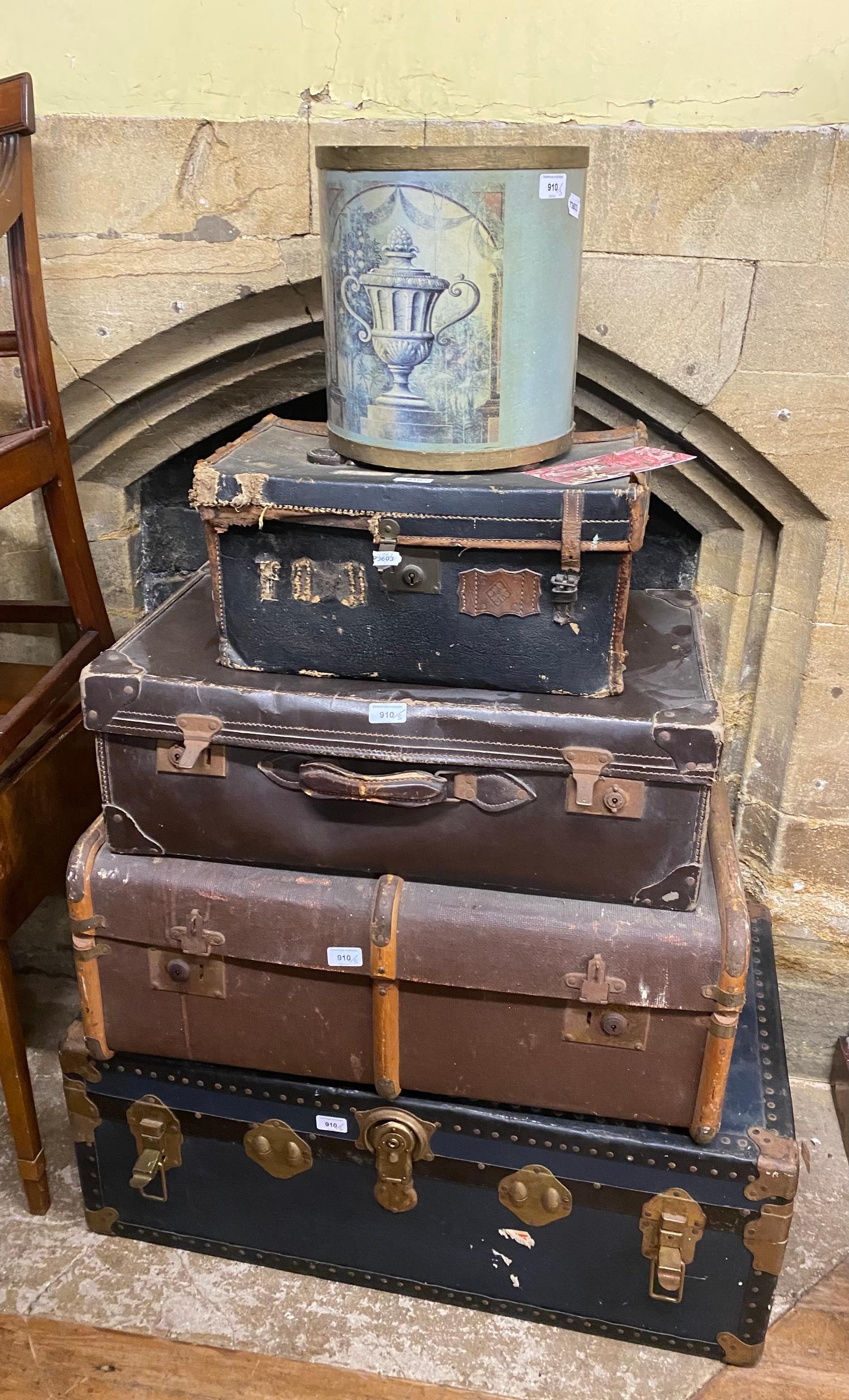 A cabin trunk, another trunk, two suitcases, and a bin (5)