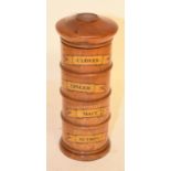 A modern treen spice tower, 21 cm high