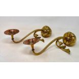 A pair of W. A. S. Benson brass and copper counterweight candlesticks, with seedpods, one stamped