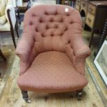 A 19th century button back armchair