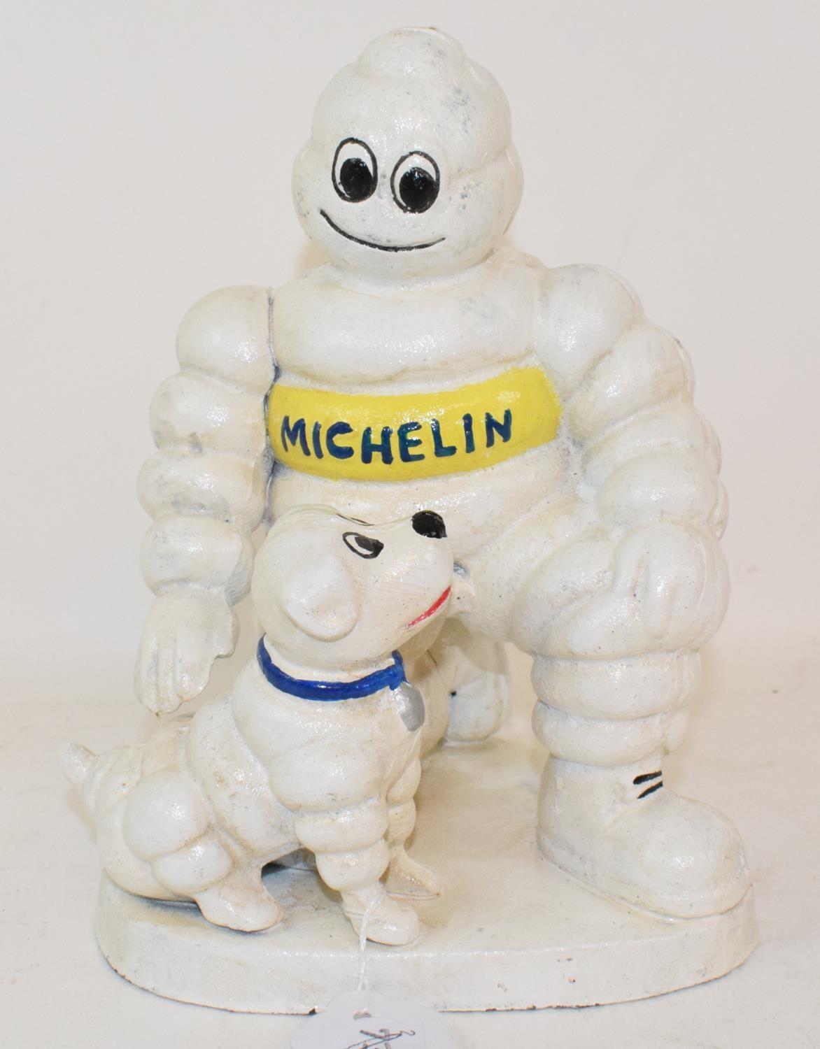 A modern cast metal figure of the Michelin man, 22 cm high