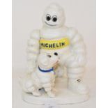 A modern cast metal figure of the Michelin man, 22 cm high