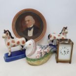 A Watcombe style terracotta plate, painted a gentleman, other ceramics and a carriage clock (2