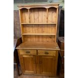 A pine dresser, 108 cm wide, two pine corner cabinets, and a pine wall shelf (4)