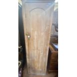 A pine cupboard, 180 cm high x 58 cm wide