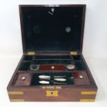 A 19th century mahogany and brass bound jewellery box, with a fitted interior, 30 cm wide