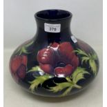 A Moorcroft pottery anemone pattern vase, of compressed circular form, 20 cm high
