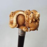 A walking stick, the Japanese ivory handle carved in the form of rats, on rosewood shaft, 91 cm