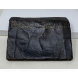 An 18th century leather pouch, embossed John Bayley Refiner in Foster Lane 1748, 19 cm wide