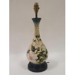 A Moorcroft pottery lamp, decorated flowers, 35 cm high