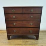 A 19th century mahogany chest, having two short and three long graduated drawers on bracket feet, 95