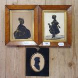 A Victorian bronze tinted silhouette of a girl holding a doll, 15 x 11 cm, her pair, possibly her