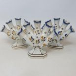 A pair of early 19th century pearlware tulip vases, 17 cm high, and another similar (3)