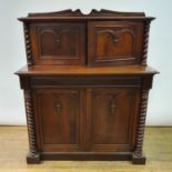A 19th century mahogany chiffonier, the superstructure with two cupboard doors, above a base with