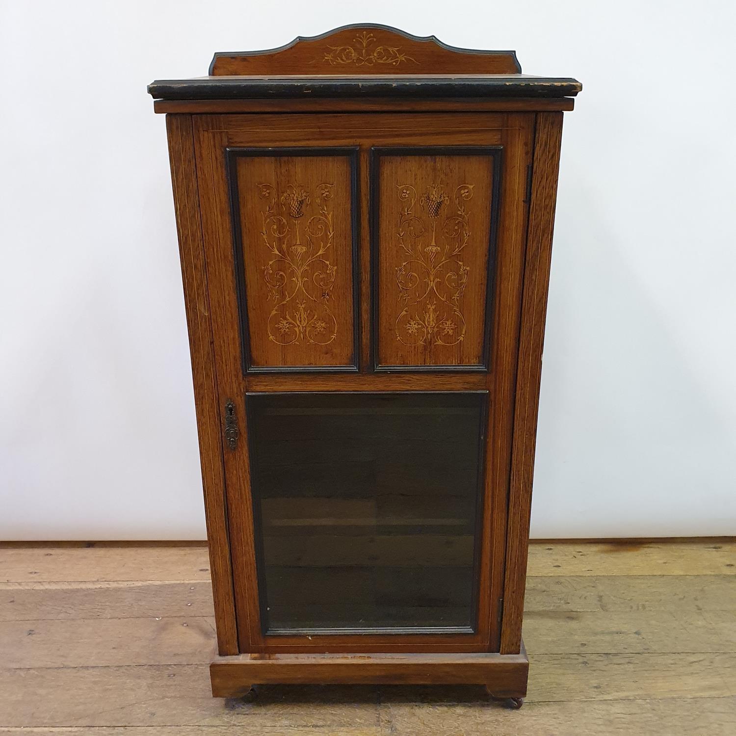 A 19th century rosewood and marquetry inlaid music cabinet, 54 cm wide