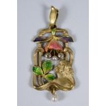 An Art Nouveau 18ct gold, enamel, diamond and seed pearl pendant, decorated a lady, a flower and