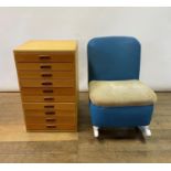 A modern teak specimen cabinet, of ten drawers, 70 cm high x 45 cm wide, and a modern rocking