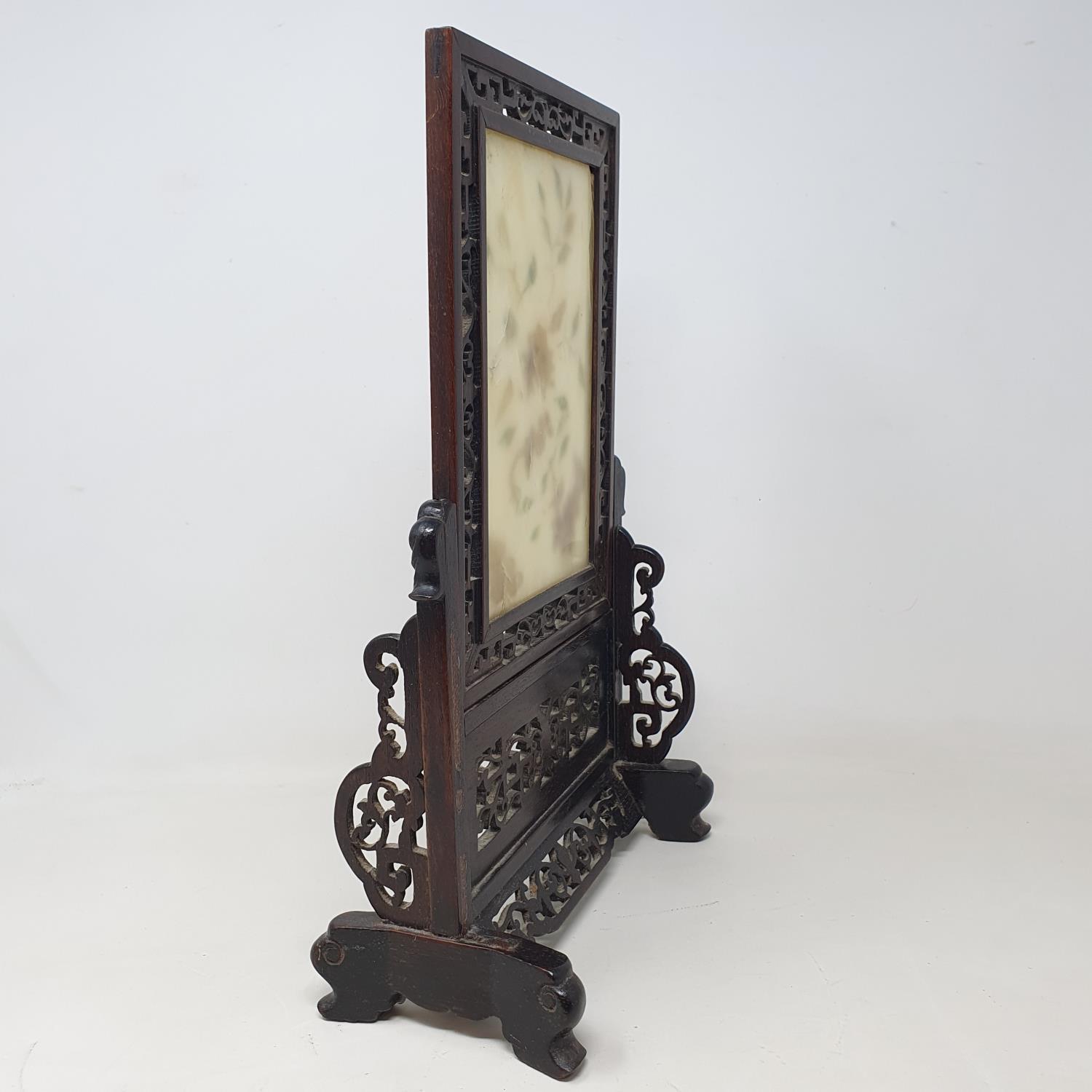 A Chinese table screen, with a pierced hardwood frame, the screen inset with hard stones in floral - Image 4 of 4