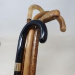 A walking stick, with a horn handle, 91 cm, and three others (4)