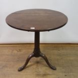 A George III mahogany tripod table, 62 cm diameter