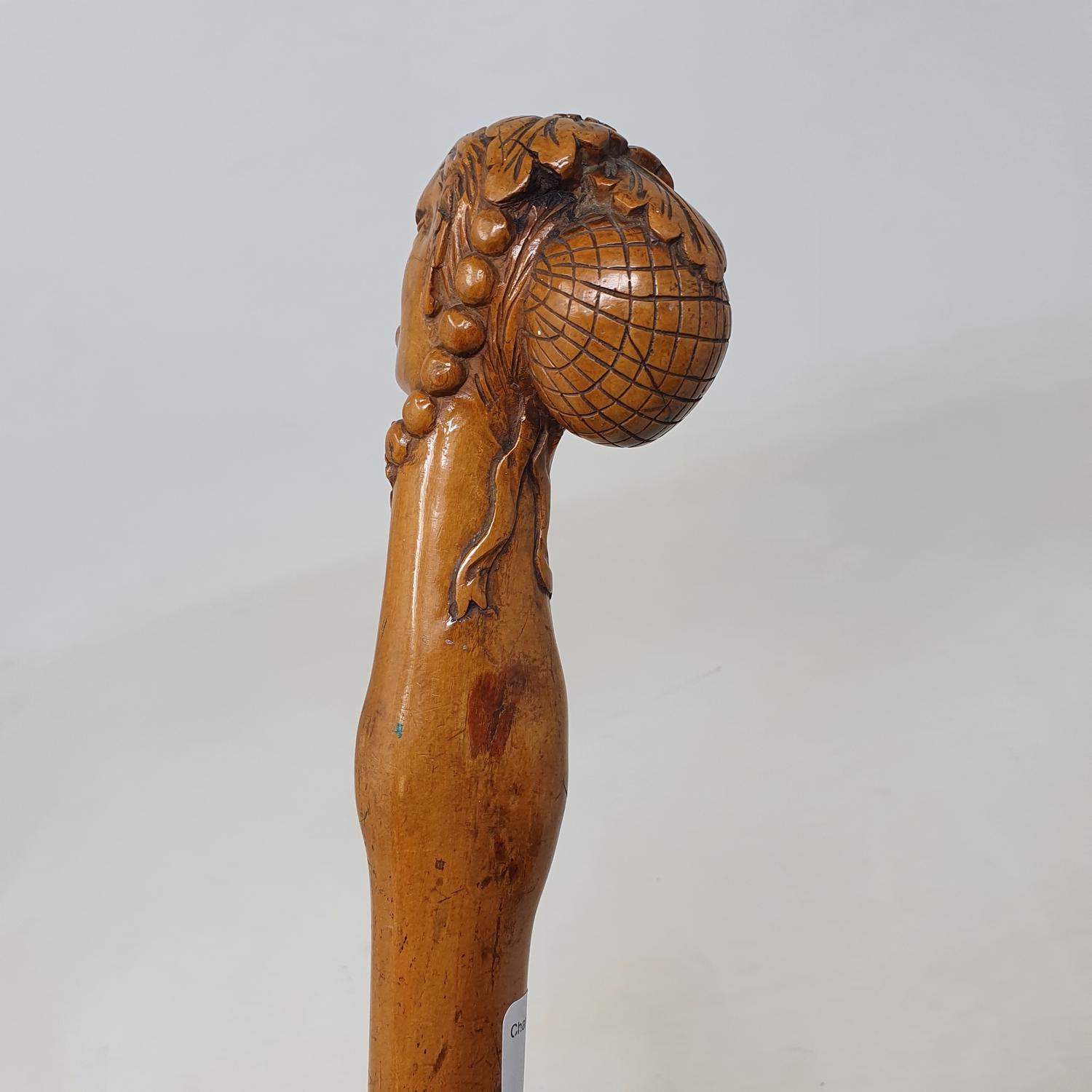 A 19th century folk art walking stick, the carved handle in the form of a lady in a bonnet and - Image 3 of 8