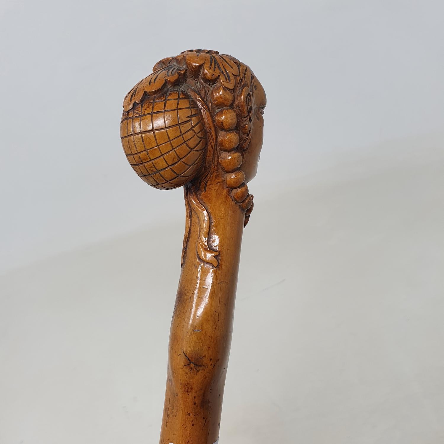 A 19th century folk art walking stick, the carved handle in the form of a lady in a bonnet and - Image 4 of 8