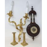 A pair of rococo style gilt metal wall lights, 38 cm high, two pairs of brass candlesticks, and