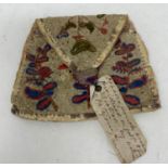 A late 18th/early 19th century embroidered purse, decorated birds and flowers, 12 cm wide