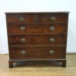 A 19th century mahogany chest, having two short and three long graduated drawers, on bracket feet,